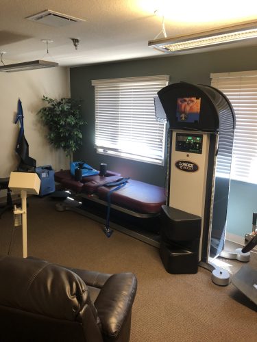 Treatment beds and chiropractic equipment inside Spine & Injury Center of Grand Junction