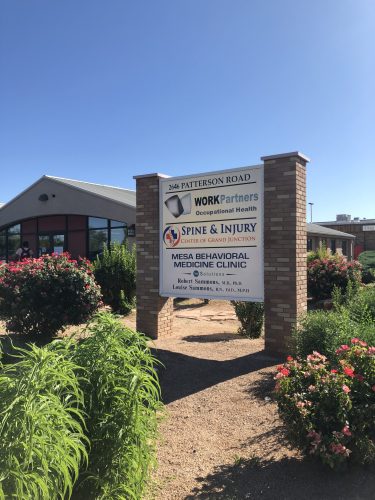Exterior signage of Spine & Injury Center of Grand Junction chiropractic office in Grand Junction, Colorado