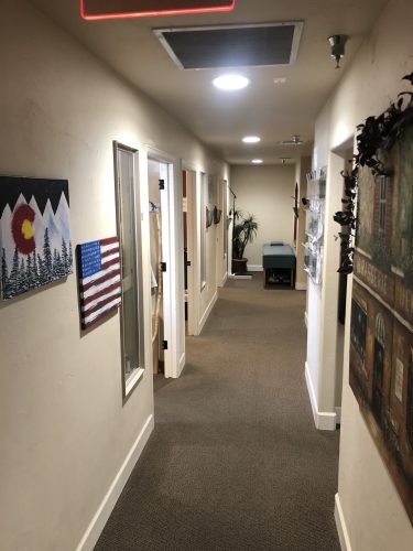Interior entrance area of Spine & Injury Center of Grand Junction showcasing a clean and welcoming chiropractic office environment